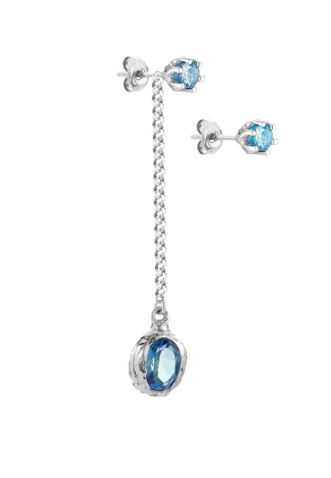 Long silver earring with a stone