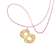 Gold number 8 pendant with a diamond. 14k gold