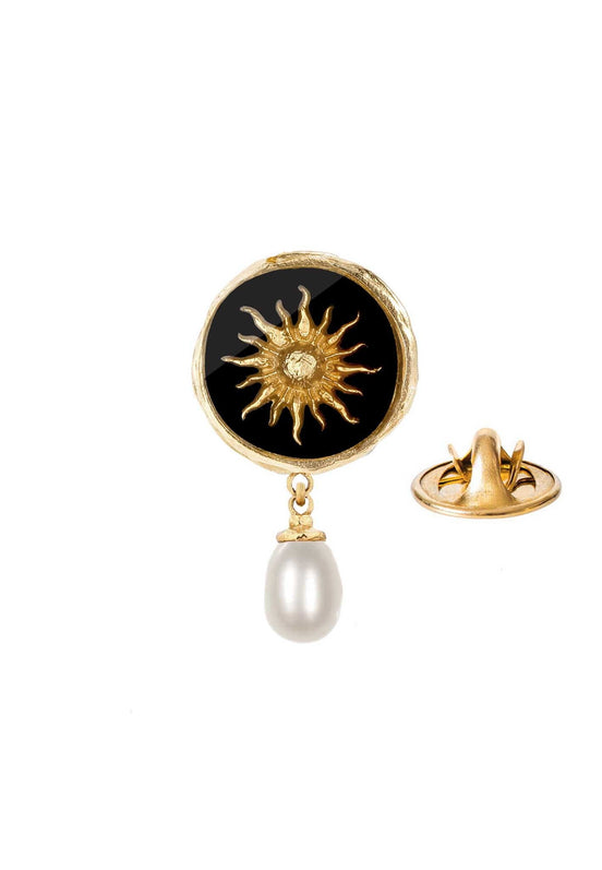 Gilt sun pin with a pearl.
