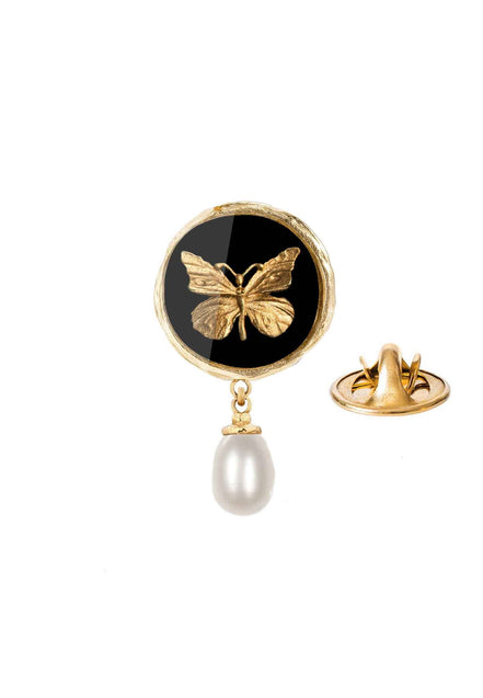 Gold-plated butterfly pin with a pearl.
