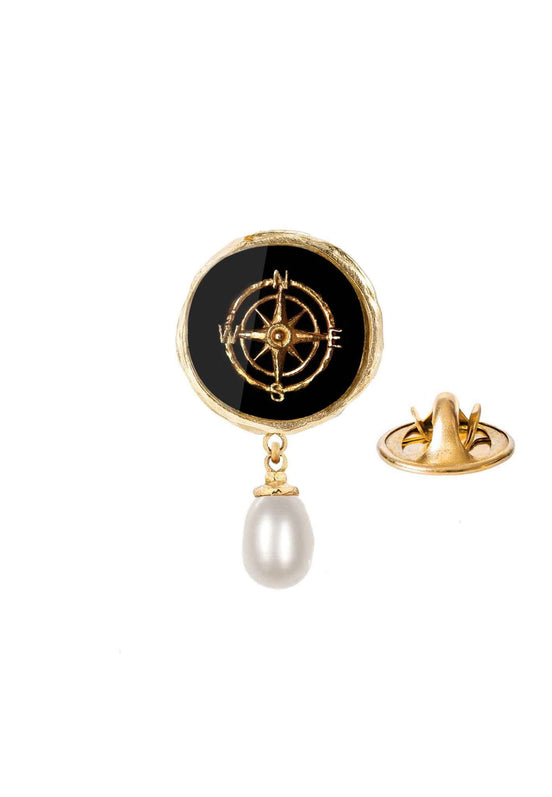 Gold-plated compass rose pin with a pearl
