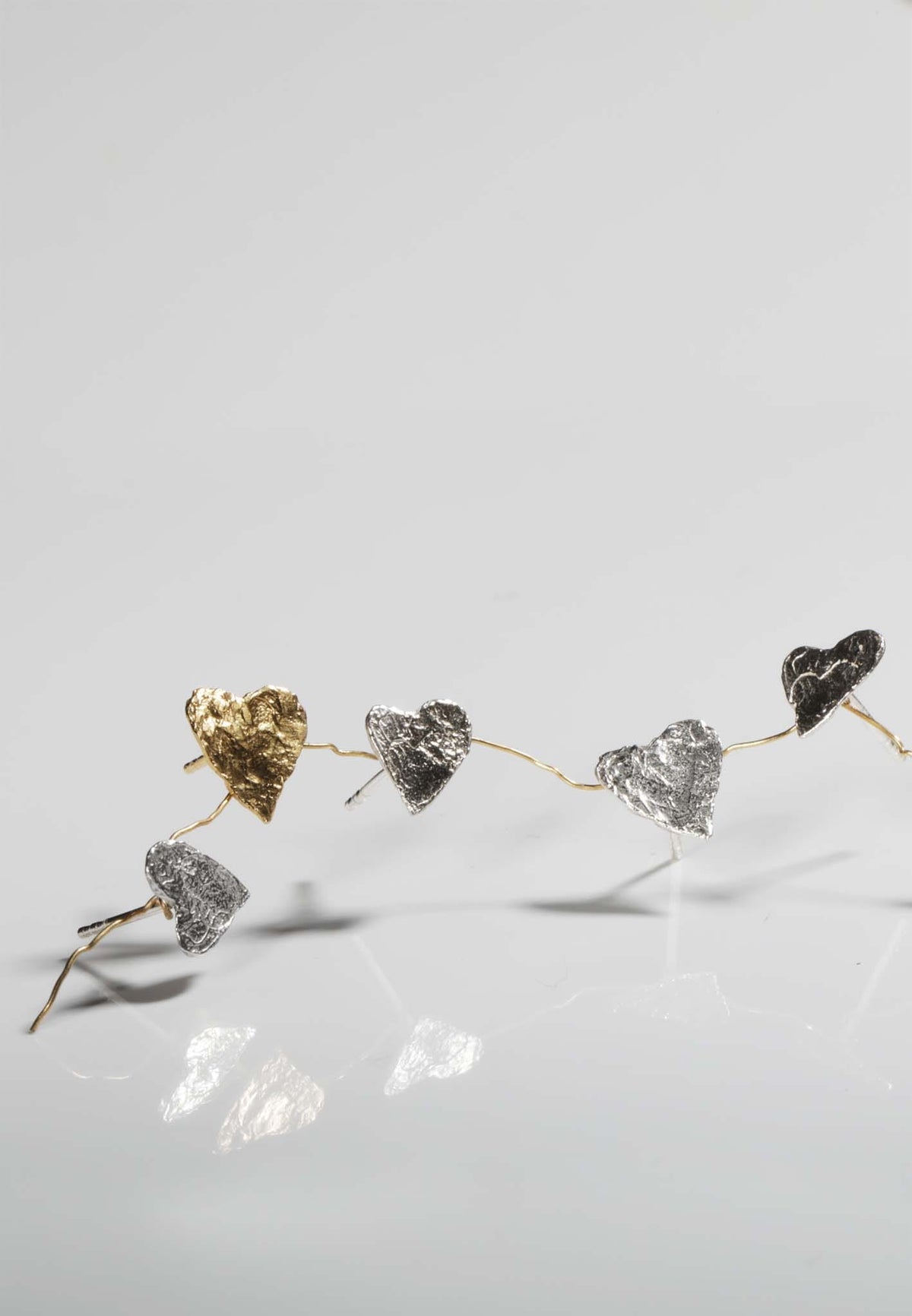 Silver earrings gold heart