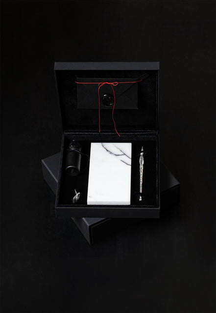 Silver pen with black diamond