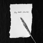 Silver pen with black diamond