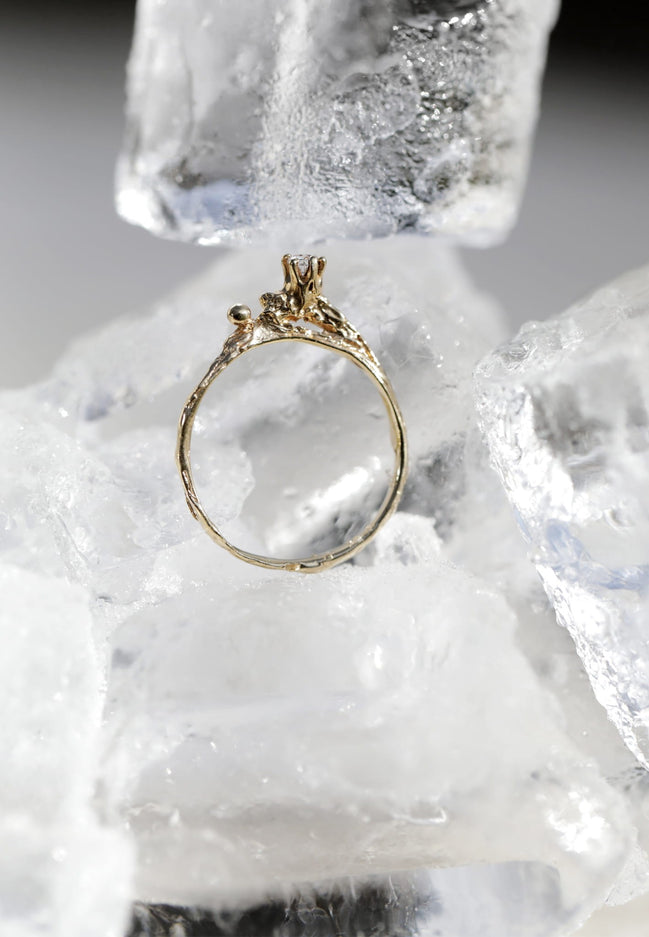 Gold ring 7:28. Yellow gold 585 with a white diamond