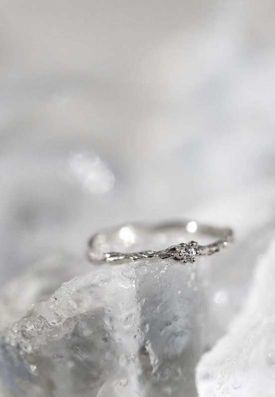 Gold ring 14:03 White gold 585 with a white brilliant-cut diamond