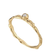 Gold ring 8:18. Yellow gold 585 with a white brilliant.