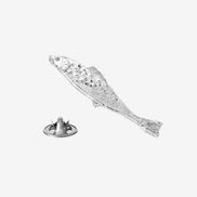 Silver fish-themed pin